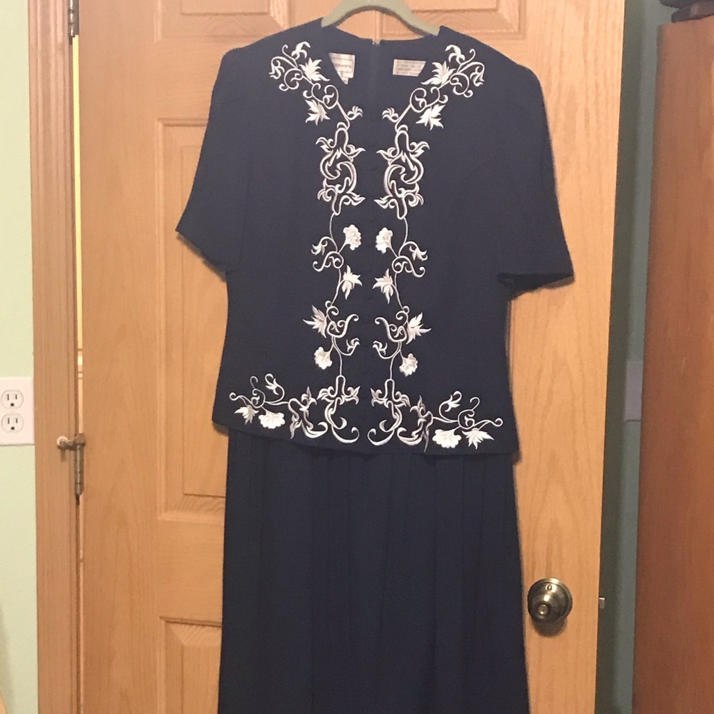 A gorgeous Karin Stevens navy blue dress